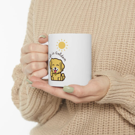 Woman holding Life is golden coffee mug